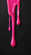 dripping pink paint on black background
