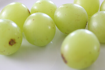 bunch of green grapes. green grapes with selective focus. green natural food.