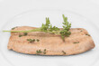 natural baked wild salmon fillet with parsley twig on a plate