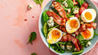 A Bowl of Spinach Salad with Bacon Egg and Blue