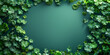 Trefoil on a green background, located along the edges. Empty space for text. Flat lay photography of St. Patrick's Day decorations.