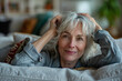 © Ala - Woman Laying on Bed With Hands on Head