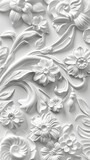 Fototapeta Do przedpokoju - A white embossed background of flowers and leaves displays an intricate, tactile texture of depth and visual interest. Flowers and leaves carved in relief on the background.