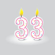 Celebratory 33rd birthday candle design. Brightly colored dots on white, dual flames. Vector illustration. EPS 10.