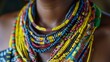 The intricate patterns of a tribal necklace on a womans chest tell the story of her cultural heritage and identity. .