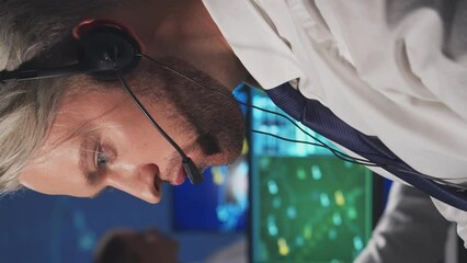 Wall Mural - Workplace of the air traffic controllers in the control tower. Team of professional aircraft control officers works using radar, computer navigation and digital maps.