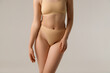 © looking2thesky - Fit and healthy. Beautiful female body on white background. Beauty, cosmetics, spa, depilation, diet and treatment, fitness concept. Fit and sportive, sensual body with well-kept skin in underwear.