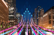 Chicago downtown skyline with futuristic hologram arrows over the bridge, nighttime cityscape background, future technology concept. Double exposure