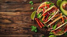 This Stock Photo Shows Three Tacos With Vegetables And Meat On A Wooden Background From A Top-down View. Cinco De Mayo Celebration Idea.