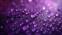 A Close-up View Of A Purple Water Droplet, With A Vibrant And Sparkling Background