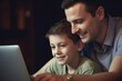 © MediaRaw - A man and a boy are looking at a laptop together