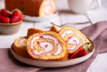 Wall Mural - Swiss roll with strawberries and cream, homemde dessert