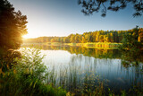 Fototapeta Natura - Fabulous views of untouched wildlife and a magical lake at dawn.