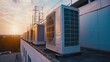 Air conditioning units on rooftop at sunset. Climate control and industrial HVAC system concept