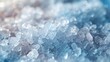 Aqua background with a textured surface and frosty crystals clinging to the glass