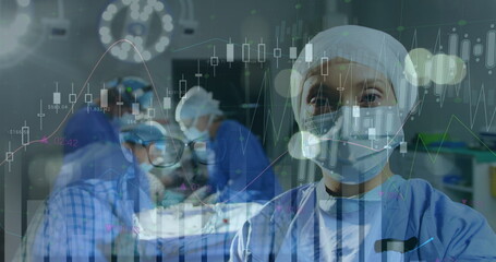 Wall Mural - Image of data processing over surgeons in operating theatre