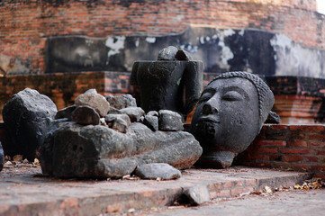 Canvas Print - The Face of Buddha. The part of ancient religious sculpture in buddhism temple in Thailand