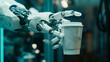 © ismael - a robot hand holding a glass of coffee