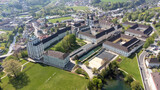 Fototapeta Miasta - Kremsmünster, Upper Austria, Austria - 04.13.2024: monastery of Kremsmünster in Upper Austria, aerial photography