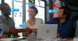 © vectorfusionart - Image of changing numbers, icons in message boxes over diverse coworkers shaking hands in office