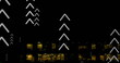 Image of multiple up arrows over aerial view of illuminated modern building against night sky