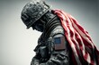 © Wirestock - a soldier in camouflage is looking at his phone with the american flag on it