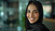 A smiling Arab businesswoman Wearing UAE Emirati Traditional Dress, black abaya, stands  in her office, Arabian Pretty Woman in the Emirates, generative ai.