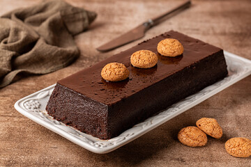 Wall Mural - Bonet, typical chocolate sweet from Piedmont, Italy. Creamy dessert made with eggs, milk, caramel, amaretti almond cookies and cacao.