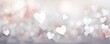 Light silver background with white hearts, Valentine's Day banner with space for copy, silver gradient, softly focused edges, blurred