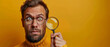 A comical portrait of a man investigating something with a magnifying glass against a yellow background, wearing a sweater.