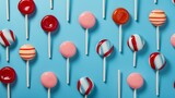 Fototapeta Kwiaty - Delicious Blow Pops Candy on solid background.