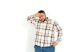 © Vitalii - european fat young man emotions of pain on white background