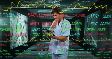 Wall Mural - image of data processing over caucasian male doctor with tablet