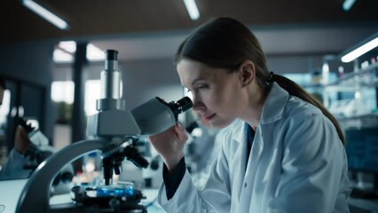 Aufkleber - Portrait of a Beautiful Caucasian Student Working on a Research Project in College. Medical Research Scientist Looking at Biological Samples Under a Microscope in an Applied Science Laboratory
