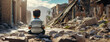 A young boy sits alone amidst the ruins of a devastated city. The powerful image reflects solitude and the aftermath of conflict.