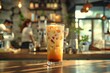 © DJSPIDA FOTO - Iced coffee with milk in a tall glass on a cafe table