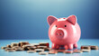 Reflective Pink Piggy Bank Amidst Scattered Coins on a Deep Blue Background
