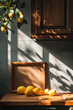 Mockup cadre en bois clair de cuisine avec des citrons et un citronier, mise en situation, environnement ensoleillé et lumineux, Nature morte, cuisine ancienne