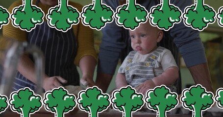 Poster - Image of broccoli icons over caucasian family cooking