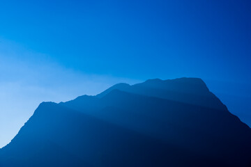 Wall Mural - doi luang chiang dao mountain at blue evening twilight