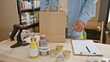 © Krakenimages.com - Heartwarming snapshot, handsome young hispanic man packing canned food into paper bag for charity center donation - enthusiastically volunteering his time and energy at community service