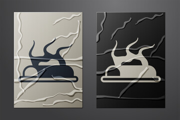 Wall Mural - White Campfire icon isolated on crumpled paper background. Burning bonfire with wood. Paper art style. Vector