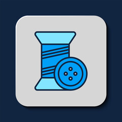 Poster - Filled outline Sewing thread on spool and button icon isolated on blue background. Yarn spool. Thread bobbin. Vector