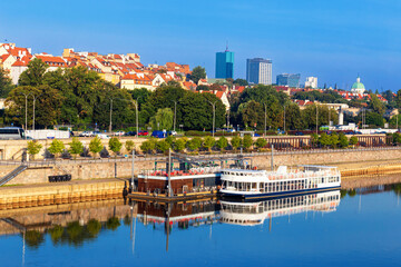 Wall Mural - Cityscape - view of the district of Srodmiescie with the Old Town in the center Warsaw from the Vistula River, Poland