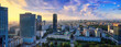 Cityscape at sunset, panorama, banner - top view of central Warsaw, the neighbourhoods of Wola and Zelazna Brama, located within Srodmiesciee district in Warsaw, Poland
