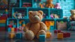 A stuffed toy Teddy bear sits on the wooden floor among toys in a playful room