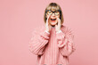Elderly woman 50s years old wear sweater shirt casual clothes glasses scream sharing hot news about sales discount, hands near mouth isolated on plain pastel light pink background. Lifestyle concept.