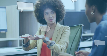 Poster - Image of speech bubbles over diverse business people discussing work