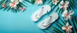 A pair of white sandals resting on a blue surface, perfect for a beach vacation or a casual summer day out.