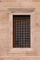 Wall Mural - Elements of architectural decorations of buildings, old windows and window openings, arches and patterns. On the streets in Turkey, public places.